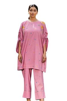 Pink kaftan with floral applique work and embroidered buttis. Paired with a pant. - Aza Fashions Spring Festive Palazzo Set With Embroidered Sleeves, Pink Resham Embroidery Pant Set For Spring, Summer Straight Kurta Set With Embroidered Sleeves, Summer Straight Kurta With Embroidered Sleeves, Summer Embroidered Sleeves Straight Kurta Set, Summer Sets With Embroidered Sleeves And Straight Kurta, Spring Cotton Sets With Embroidered Sleeves, Festive Pink Cotton Pants, Pink Cotton Palazzo Set With Floral Embroidery