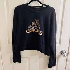 Nwot Cozy Black Cropped Sweatshirt With Adidas Logo Adidas Crew Neck Tops For Fall, Adidas Oversized Crew Neck Top, Adidas Black Sweatshirt For Fall, Oversized Adidas Crew Neck Top, Adidas Tops With Graphic Print For Fall, Adidas Winter Tops Relaxed Fit, Adidas Relaxed Fit Winter Tops, Adidas Long Sleeve Sweatshirt With Letter Print, Oversized Adidas Sweatshirt With Long Sleeves