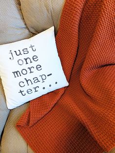 a pillow that says just one more chap perr on it sitting on a couch