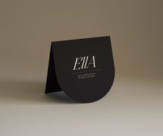 a black business card with the letter eia on it