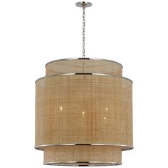 a chandelier hanging from the ceiling with a beige fabric shade on it's side