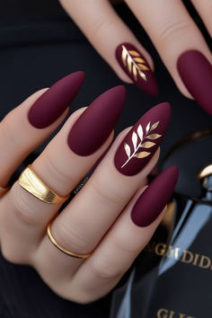 Berry Matte Nails, Matte Plum Nails Almond, Fall Season Nails Matte, Dark Red Acrylics With Design, November Nails Fall Matte, November Matte Nails, Dark Red Nails With Gold Design, Cute Maroon Nails, Winter Nails Maroon