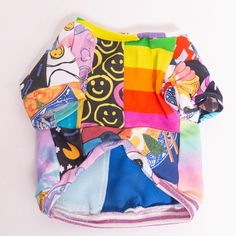 multicolored cloth diaper on white background with clippings to the side