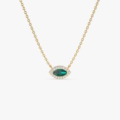 Enhance your style with our elegant 14K Gold May Birthstone Charm Necklace featuring a Marquise Emerald and Diamond pendant. This exquisite piece not only represents the beauty of May's birthstone but also carries a touch of good luck with its Evil Eye design. Make it a meaningful addition to your collection, by combining sophistication and symbolism in this Emerald Gemstone Necklace.  14K Gold Marquise Emerald Necklace, Diamond Accented May Birthstone Pendant, Evil Eye Good Luck Charm, Special Birthday Gift for Emerald Lovers. * Made to Order. * Gold Kt: 14K Solid Gold * Custom Gold Color: Rose Gold, Yellow Gold, White Gold * Width:8MM * Height: 5MM * Round Diamonds: 18pcs x 0.90MM * Marquise Emerald: 1pc x 6x3MM * Total Stone Weight:0.30ctw * Diamond Color-Clarity: G Color SI Clarity * S Elegant Green Marquise Necklace, Elegant Marquise Birthstone Necklaces, Elegant Marquise Birthstone Necklace, Elegant Turquoise Necklace With Diamond Accents, Elegant Turquoise Necklaces With Diamond Accents, Elegant Emerald Necklace With Gemstone Accents For May Birthstone, Elegant Emerald Necklaces With Gemstone Accents, Elegant 14k Gold Necklaces With Gemstone Accents, Elegant Necklaces With Gemstone Accents For May Birthstone