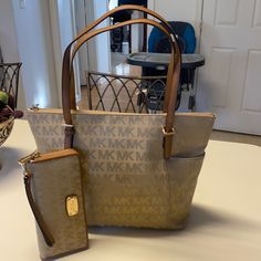 Brand New With Tags!!! Tan Mk Signature Tote Bag And Wallet... Never Carried. Wallet And Purse Can Be Sold Separate With Reasonable Offers!!!! If More Pics Needed Please Ask. Beige Wallet With Gold-tone Hardware For Everyday, Bags Michael Kors, Mk Bags, Tote Purse, Michael Kors Bag, Women Handbags, Michael Kors, Bag Lady, Purse