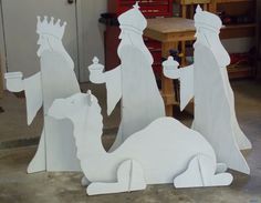 three paper cut out of the nativity scene