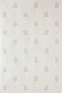 a white wallpaper with small bees on it