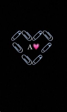 a heart made out of links with the word a in it's center on a black background