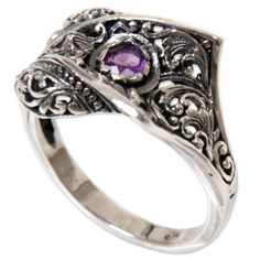 Indonesian artisan Agung Jagra presents this handcrafted cocktail ring. A faceted amethyst gleams in the center of decorative sterling silver in this unique and elegant design. Sterling Silver Amethyst Promise Ring With Intricate Design, Sterling Silver Amethyst Ring With Intricate Design, Ornate Amethyst Purple Ring, Ornate Sterling Silver Amethyst Ring, Ornate Sterling Silver Amethyst Gemstone Ring, Unique Amethyst Ring With Accent Stones, Ornate Purple Amethyst Ring, Ornate Sterling Silver Amethyst Ring For Formal Occasions, Ornate Amethyst Silver Rings