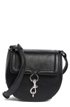 Smooth leather defines this chic and compact saddle bag fashioned with a front snap-flap closure and gleaming silvertone hardware. Snap-flap closure Top crossbody strap Interior slip pocket Lined Leather Imported Classic Satchel With Silver-tone Hardware And Flap, Leather Flap Bag With Silver-tone Hardware, Black Flap Bag With Turn-lock Closure, Modern Crossbody Saddle Bag With Turn-lock Closure, Classic Crossbody Saddle Bag With Silver-tone Hardware, Classic Saddle Crossbody Bag With Silver-tone Hardware, Black Leather Saddle Bag With Silver-tone Hardware, Crossbody Shoulder Bag With Silver-tone Hardware, Silver-tone Hardware Crossbody Shoulder Bag