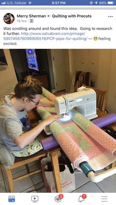 a woman using a sewing machine to sew fabric