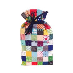 a small bag made out of patchwork fabric