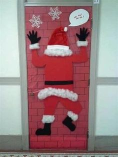 a door decorated to look like santa clause