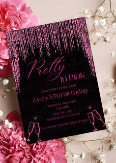 a pink and black birthday party card on top of flowers with the words pelly in pink