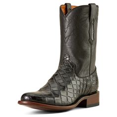 Handcrafted with the old-world artistry of León, Mexico, and the modern comfort Ariat is known for, the Clanton boot is ready to be worn for a lifetime. Elegant and refined, it's luxurious from the premium American alligator leather foot to the buttery-soft calfskin hung lining. Bench Made Clanton Western Boot | Product Features : 0 : Removable All Day Cushioning insole with genuine vegetable tanned, anti-odor leather sock liner that molds to your foot, 1 : Cork filled forefoot for added comfort American Alligator, Western Style Boots, Leather Socks, Style Boots, Western Boot, Liner Socks, Leather Conditioner, Black American, Midnight Black