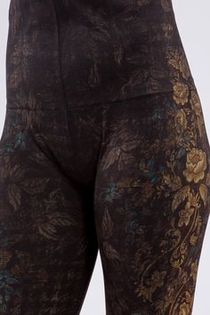 Made in the USA, our super soft printed leggings are America's favorite! Our high-waist leggings feature M.Rena's iconic tummy control waistband with an exclusive print you won't find anywhere else. Leather-bound manuscripts. Brass torches in a dusty library. Academia meets romance. Gold foil Baroque-inspired florals cascade along the leg, contrasting with a subdued houndstooth pattern.