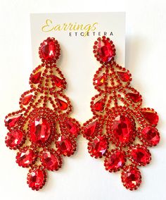 Gorgeous statement earrings that are sure to compliment your outfit.Choose from 4 beautiful colors.. Red Topaz, Your Outfit, Ornament Wreath, Statement Earrings, Beautiful Colors, Topaz, Silver, Red, Color