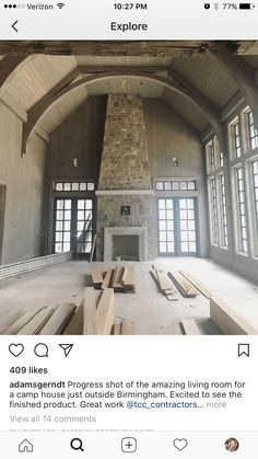 an instagramted photo of a fireplace in a large room