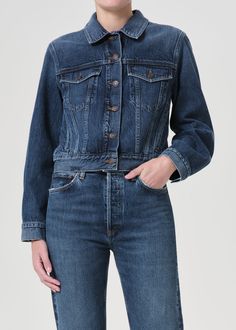 90’s inspired. This denim jacket is cut with a slightly cropped fit and classic details, like chest flap pockets. This fit is true to size. Looks Like: Clean dark indigoFeels Like: Weightless, non-stretch regenerative cotton that will grow softer with each wear 90s Jean Jacket, 90s Jean, 90s Jeans, Cami Nyc, Jumpsuit Jacket, Dark Indigo, New Tops, Sweater Blouse, Sweater Skirt