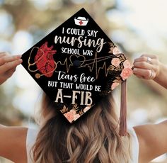 a woman wearing a graduation cap that says i could't say nursing school was tears free but that would be affi