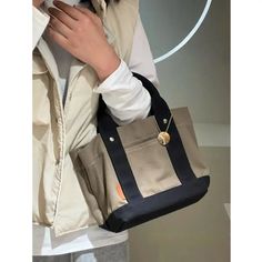 SPECIFICATIONSBrand Name: NoEnName_NullOrigin: Mainland ChinaCN: GuangdongLining Material: POLYESTERPlace Of Origin: GUANG DONG ProvincePlace Of Origin: GUANG DONG ProvinceShape: Casual ToteMain Material: CANVASStyle: CasualClosure Type: haspModel Number: Women High-quality Canvas BagPattern Type: SolidInterior: Interior Slot PocketGender: WOMENDecoration: noneExterior: noneHardness: SOFTType 1: Women High-quality Canvas BagType 2: Multi-divided Tote BagType 3: Student SchoolbagType 4: Portable HandbagType 5: Large Capacity Lunch Bucket BagChoice: yessemi_Choice: yes Casual Tote Satchel For Daily Use, Casual Double Handle Shoulder Bag For Daily Use, Casual Handheld Bucket Bag For School, Beige Large Capacity Bag For Daily Life, Casual Bucket Bag For School, Beige Satchel For Daily Life, Trendy Beige Bags For Daily Use, Daily Life Beige Satchel Bag, Trendy Beige Bags For Daily Life