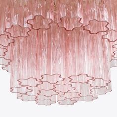 a pink chandelier hanging from the ceiling