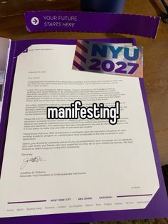 a purple folder with the new york times logo on it and an image of a manfesting