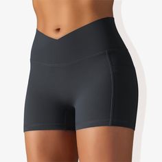 The Anna-Kaci Women's V-Cross Front Wide Band Biker Shorts are a stylish and functional addition to your activewear collection. These yoga shorts feature a unique V-cross front wide band for a secure and flattering fit. Made with 4-way stretch fabric, they offer maximum flexibility and comfort during any activity. The side pocket detail provides practical storage for essentials, while the side panel design adds a trendy touch. Perfect for yoga, workouts, or casual wear, these biker shorts combin Bottom Workout, Yoga Workouts, Target Clothes, Practical Storage, Sewing Party, 4 Way Stretch Fabric, Yoga Shorts, Athletic Fits, Bottom Clothes