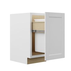 a white cabinet with an open door and drawers