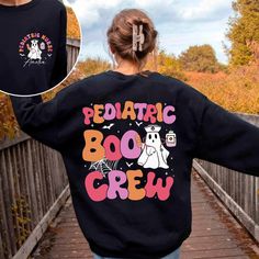 Pediatric Boo Crew Halloween Shirt, Custom Name Pediatric Nurse Halloween, Halloween Peds Nurse Shirt, Peds Crew, Nursing Halloween Shirt We've got all this and more: - Tshirt material: cotton, polyester - Sweatshirt material: cotton, polyester - Hoodie material: fleece fabric, heavy blend Production and Shipping - Processing Time: 3-5 business days - Shipping time (US): 3-5 business days - Shipping time (WW): 10-15 business days Note - Manual measurement may exist a 1-2cm difference - Actual co Halloween Pediatrics Shirts, Nurse Attire, Peds Nurse, Nurse Halloween, Pediatric Nurse, Boo Crew, Halloween Nurse, Pediatric Nursing, Nurse Shirt