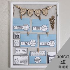 a bulletin board with paper and clothes pins attached to it's sides that say pray