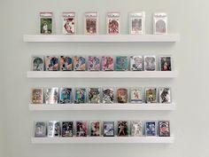 the shelves are filled with different sports cards