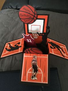 an origami basketball birthday card made to look like it is going to the basket