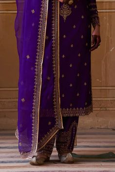 Purple chiniya silk kurta with dori and aari hand embroidery. Comes with pant and an organza dupatta. - Aza Fashions Festive Purple Palazzo Set With Intricate Embroidery, Festive Purple Embroidered Palazzo Set, Bollywood Style Purple Palazzo Set With Intricate Embroidery, Bollywood Style Purple Embroidered Palazzo Set, Bollywood Traditional Wear Made Of Silk Thread, Bollywood Style Traditional Wear With Silk Thread, Elegant Purple Palazzo Set With Zari Work, Festive Traditional Wear In Silk Thread, Traditional Dola Silk Palazzo Set With Zari Work