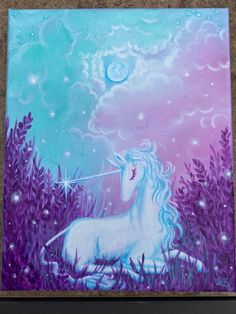 an acrylic painting of a unicorn sitting in the grass