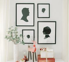 Custom Silhouette Portraits on a gallery wall Silhouette Jewelry, Silhouette Ornaments, Uncommon Gifts, Silhouette Photography, Silhouette Crafts