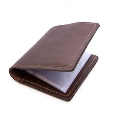 Style: BIWAL Classic Bi-fold Leather Wallet - No Window: This classic bifold leather wallet has a cash compartment, two card pockets open from the top with an extra pocket underneath, and on the other side three card pockets that are open from the side. Our American made bifold leather wallets could last you longer than any wallet you've ever owned.Features: Top Grain Leather Cash Compartment Three card pockets open from the side Two card pockets open from the top with extra pocket underneath Pl