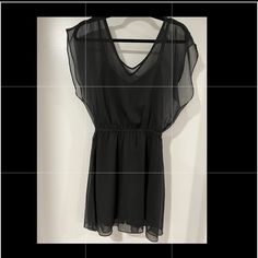 Express Black Sheer Dress Size Small Worn Once- Brand New Condition Casual Black Cocktail Dresses, Casual Sheer Dress For Date Night, Casual Sheer Mini Dress, Casual Black Mini Dress For Cocktail, Casual Black Mini Cocktail Dress, Black Sheer Dressy Dress, Dressy Black Sheer Dress, Casual Sheer Mini Dress For Date Night, Black Flowy Mini Dress For Casual Events