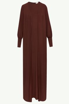 Introducing the Jenin set in Chocolate - a luxurious pairing of a sleeveless maxi dress and an open abaya. Made from buttery soft jersey fabric, this set exudes elegance and comfort. With thumbholes and a sleek design, it's the elevated basic your wardrobe needs. Model is 5'7" and is wearing size XS/58". Open Abaya, Jersey Hijab, Wardrobe Needs, Dress Set, Sleeveless Maxi Dress, Get The Look, Jersey Fabric, Set Dress, Sleek Design