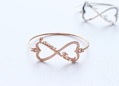 "Delicate and dainty, this infinity bracelet is great for daily wear. Send these as gifts to your loved ones, or customize one for yourself. This bracelet can be designed with any names, words, initials,roman numeral, coordinates, symbols, logo and etc. Please contact me with any questions. ► DETAILS * All materials are: Sterling silver, gold plated, rose plated * Thickness:1.3 mm * Infinity Size: 38 mm ► ORDER * Please indicate the names you want in 'Notes to Seller' at checking out. We can mak Adjustable Infinity Heart Bracelet For Mother's Day, Personalized Infinity Bracelets For Valentine's Day, Rose Gold Infinity Bracelets For Friendship, Personalized Infinity Bracelet For Valentine's Day, Personalized Infinity Bracelets For Friendship, Adjustable Infinity Bracelets For Valentine's Day, Name Bracelet Silver, Silver Infinity Bracelets, Bracelet Heart