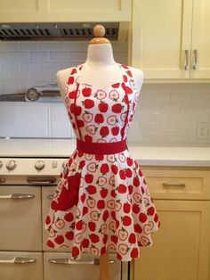 a dress on a mannequin in a kitchen