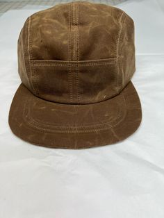 Pre-washed Cotton 5-panel Hat, Vintage Canvas Baseball Cap With Curved Brim, Retro Cotton Snapback Hat For Outdoor, Vintage Cotton Snapback Hat For Outdoor, Retro Brown Cotton Snapback Hat, Vintage Canvas Cap, Brown Flat Bill Cotton Hats, Vintage Cotton 5-panel Snapback Hat, Cotton Flat Cap For Outdoor