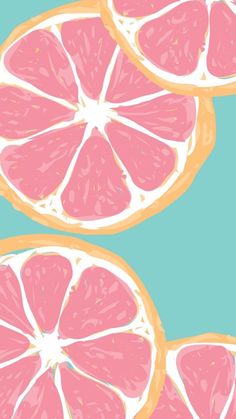 three slices of pink grapefruit on a blue background