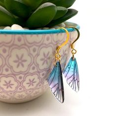 Dainty Wing Earrings In Blue With Flecks Of Gold Handmade *Open To Reasonable Counter Offers!!* Buy With Confidence!-5 Star* Posh Ambassador Ii Smoke Free Home Fast Shipper! Bundle Up! Purchases Of 2+ Get A 10% Discount! Fairy Wing Earrings, Butterfly Fairy Wings, Butterfly Fairy, Jewelry Blue, Fairy Wings, Wing Earrings, Women Artisans, Blue Butterfly, Blue Gold