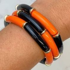 Orange And Black Stretch Bracelets Trendy Black Stretch Bangle Bracelet, Adjustable Orange Stretch Bracelet, Cheap Orange Hand-strung Jewelry, Playful Adjustable Orange Bracelets, Spiritual Orange Hand-strung Bracelets, Orange Spiritual Stretch Bracelet Hand-strung, Bohemian Orange Hand-strung Bracelet, Black Accessories, Funky Jewelry