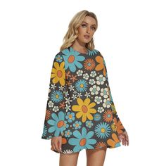 *  Embrace the timeless allure of the 70s with our Bell Sleeve Dress, echoing the iconic 70s Dress Style. * This Hippie Dress exudes vintage charm with its Blue Floral pattern, capturing the essence of Retro fashion. * Crafted from 100% polyester, this Chiffon Tent Dress ensures lightweight comfort and durability. *  Adorned with a vibrant multicolor floral pattern in orange, yellow, and blue, this dress makes a bold statement. * The semi-sheer chiffon material adds an ethereal touch, while the dress is fully lined for modesty and comfort. * Complete with bell sleeves and a keyhole behind neckline with button enclosure, this slip-on Dress offers both style and ease. Designed in California by Trendy Hip Buys. Handmade to order from Overseas Made from 100% Polyester Soft and lightweight chif Spring Hippie Long Sleeve Mini Dress, Spring Long Sleeve Hippie Mini Dress, Hippie Long Sleeve Mini Dress For Spring, Blue Retro Spring Dresses, Retro Blue Spring Dress, Hippie Long Sleeve Party Dresses, Retro Flowy Party Dress, Flowy Retro Party Dress, 70s Inspired Floral Print Dresses