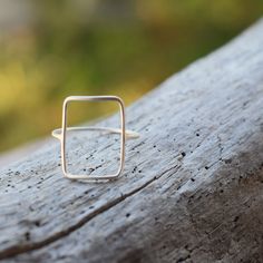 Upgrade with Express DHL shipping at checkout or purchase this listing with your order https://www.etsy.com/listing/879842121/upgrade-for-dhl-express-delivery Handmade skinny , Rectangle shaped sterling silver ring , geometric contemporary ring 1 mm thick All our products are handmade in our little workshop with much care and love. You are welcome to send us a message if you have any questions! Best, Christina OPTION TO UPGRADE AT CHECKOUT WITH DHL Express FOR DELIVERY IN 3-5 DAYS Minimalist Silver Square Cut Ring, Modern Handmade Stackable Rings For Everyday, Minimalist Sterling Silver Oblong Jewelry, Minimalist Silver Square Ring, Handmade Rectangular Minimalist Rings, Handmade Minimalist Rectangular Rings, Modern Handmade Sterling Silver Midi Rings, Handmade Modern Sterling Silver Midi Rings, Minimalist Sterling Silver Rectangular Ring