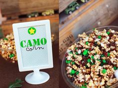 a bowl of popcorn sitting on top of a table next to a sign that says camo corn