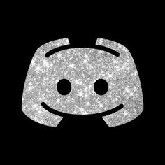 a smiley face made out of glitter on a black background