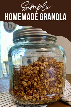 a jar filled with granola sitting on top of a table